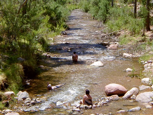 35 - People cooling off in the creek